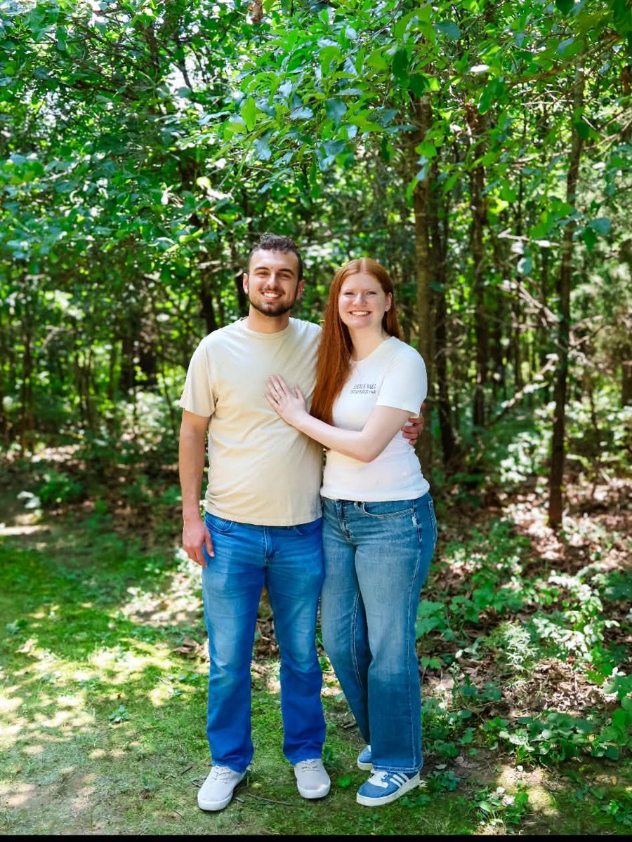 Colten and Kate standing together outdoors
