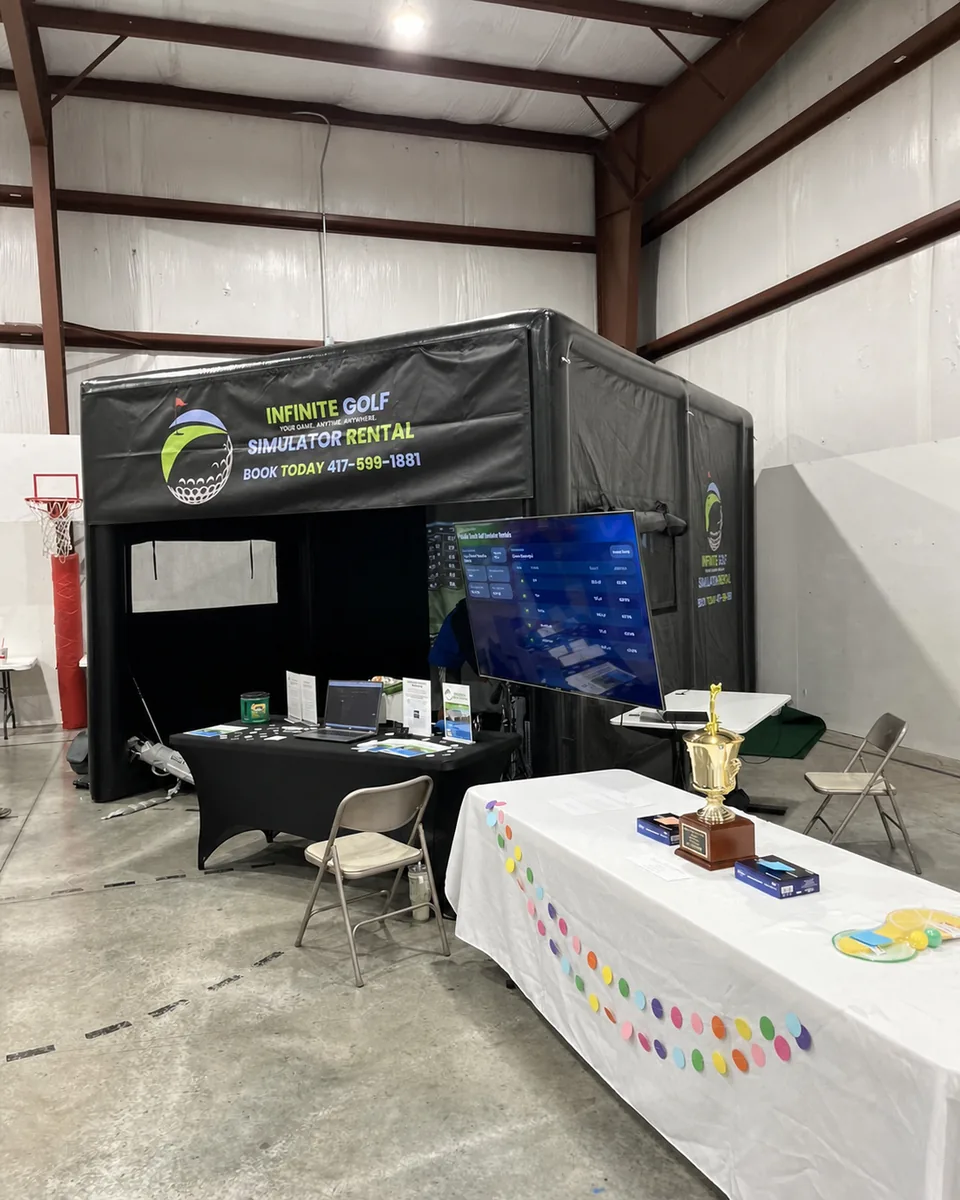 Infinite Golf enclosure and prize table at the First Christian Church Long Shot Challenge fundraiser.