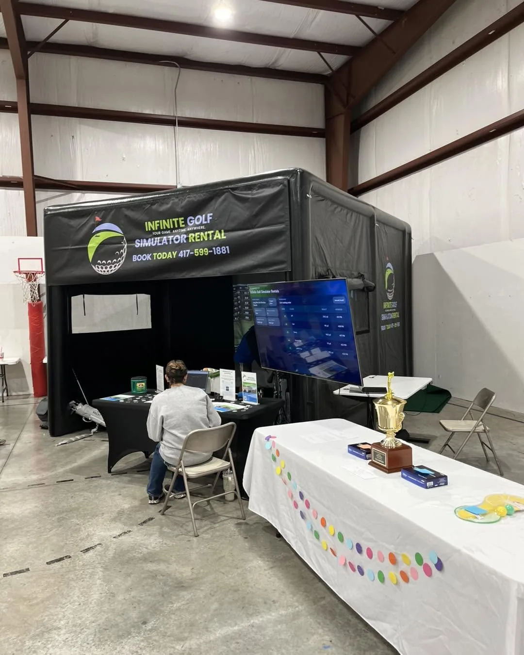 Authentic Infinite Golf simulator operating at a Southwest Missouri fundraiser