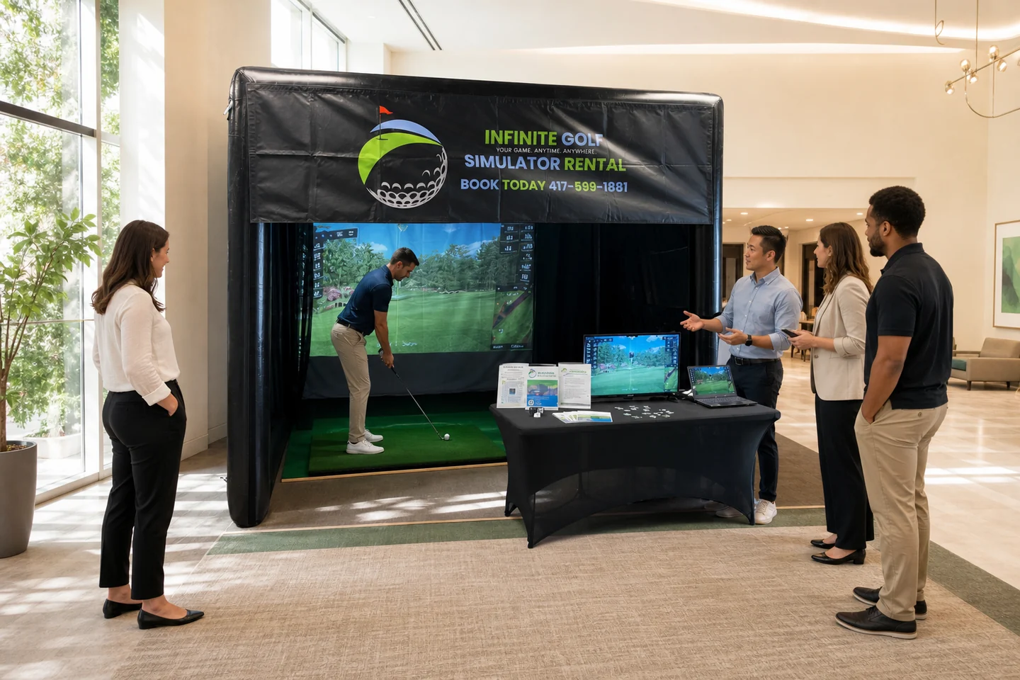 Representative corporate team-building scene around the Infinite Golf simulator